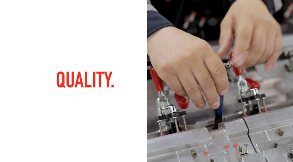 image of hands performing quality control in a plastics manufacturing job with the word Quality beside it