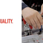 image of hands performing quality control in a plastics manufacturing job with the word Quality beside it